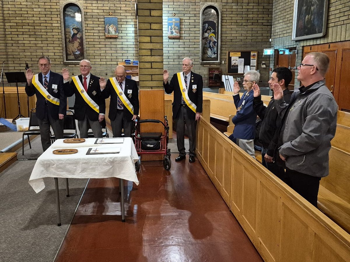 Preparing the ceremonial sash before the Exemplification