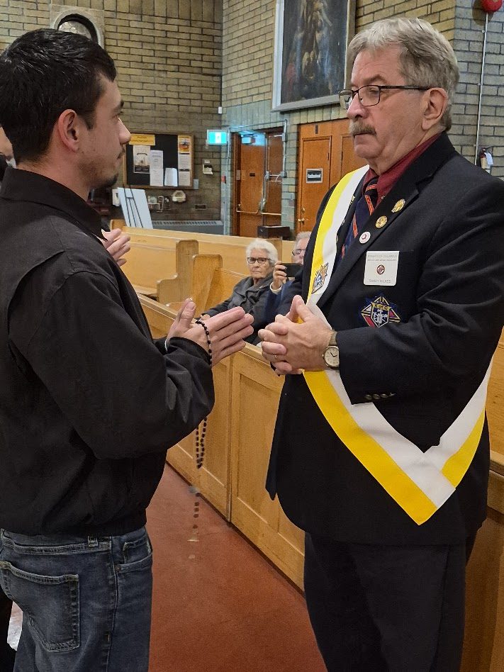 Knights standing together during the Exemplification